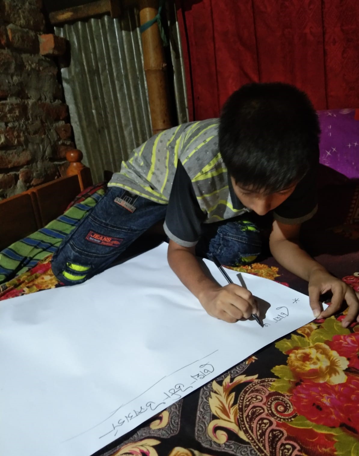 Arman making a poster on conjunctivitis awareness