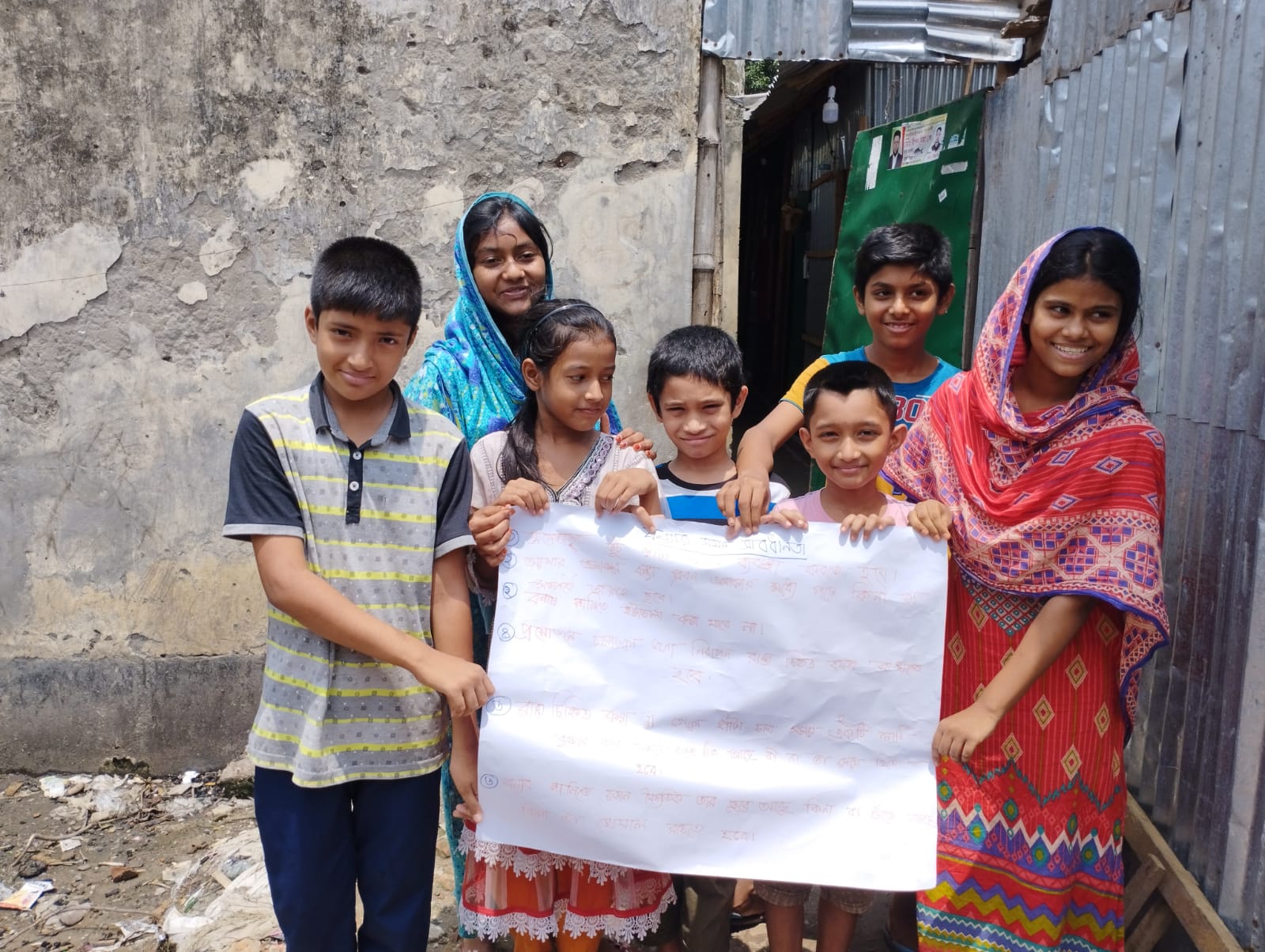 Children in Mohakhali made a poster on flood safety rules 2