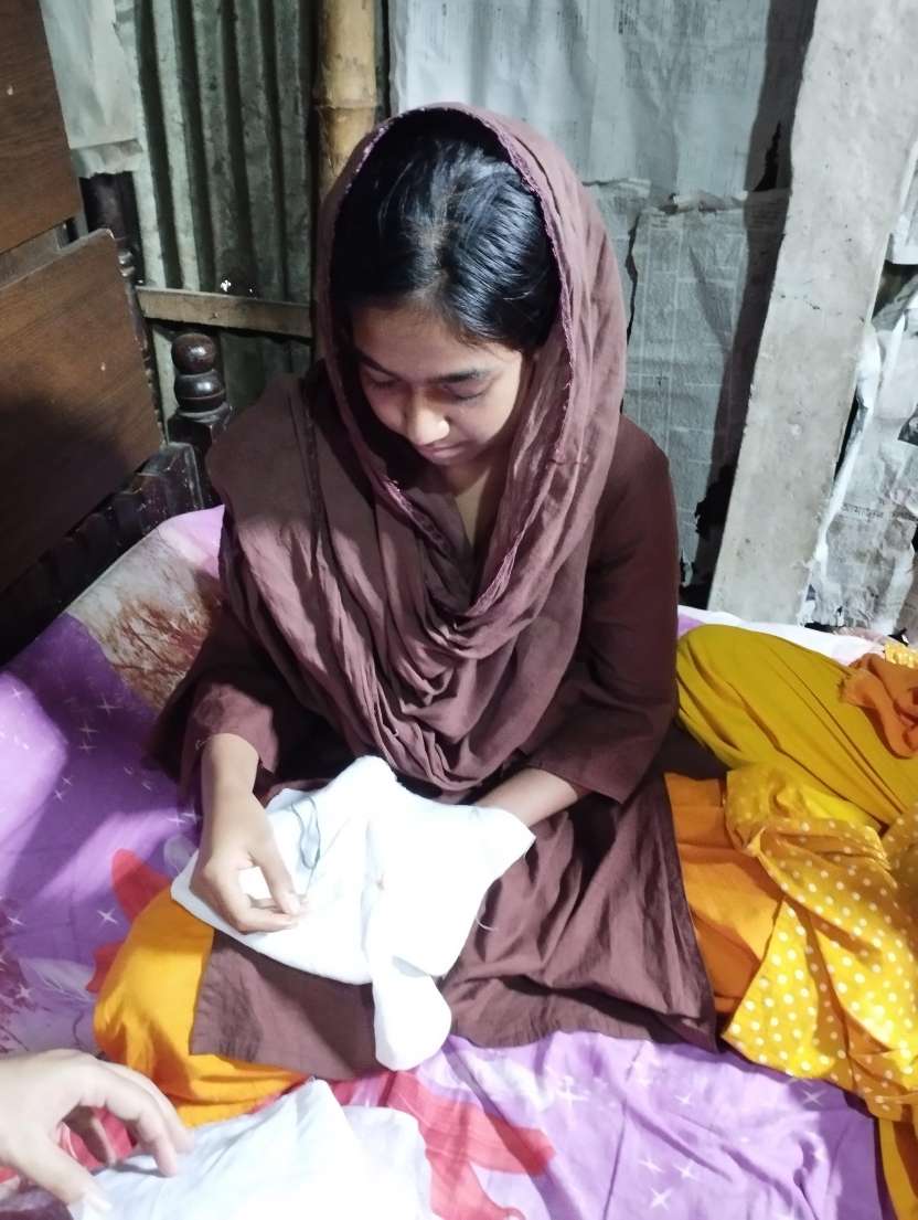 Farzana practicing the stitches
