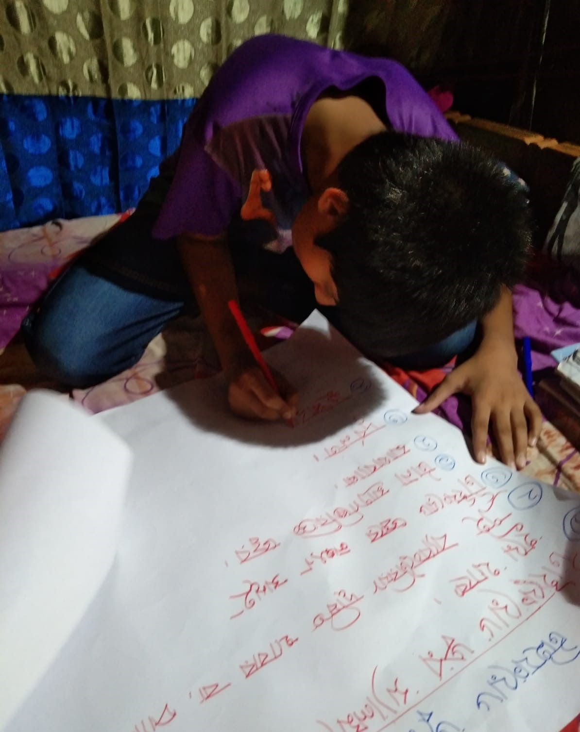 Arman making a poster on typhoid awareness