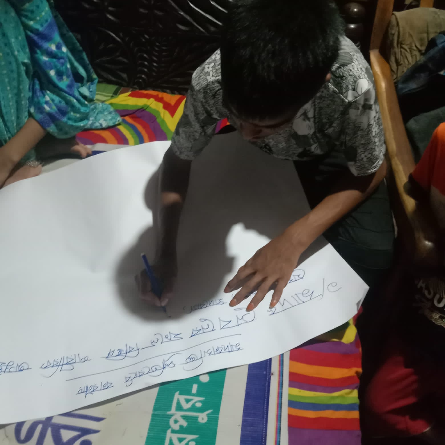 Monir making a poster on drug awareness