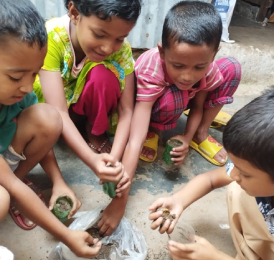 Children in Mirpur preparing soil