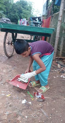 Abdur Rahman cleaning the neighborhood
