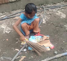Arifa cleaning the neighborhood