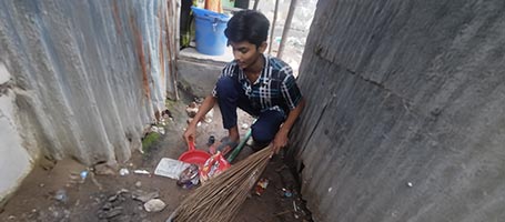 Jahid cleaning the neighborhood