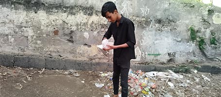 Kabir spreading bleaching powder