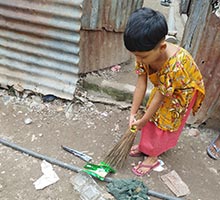 Khusaiba cleaning the neighborhood