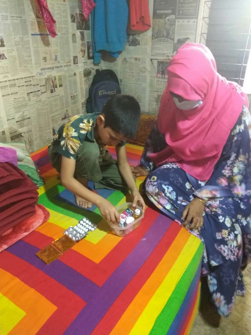 Rakib making a first-aid box