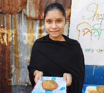 Henna participated in pitha utshob