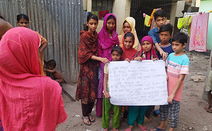 Kids in Mohakhali spreading thunderstorm awareness.jpg