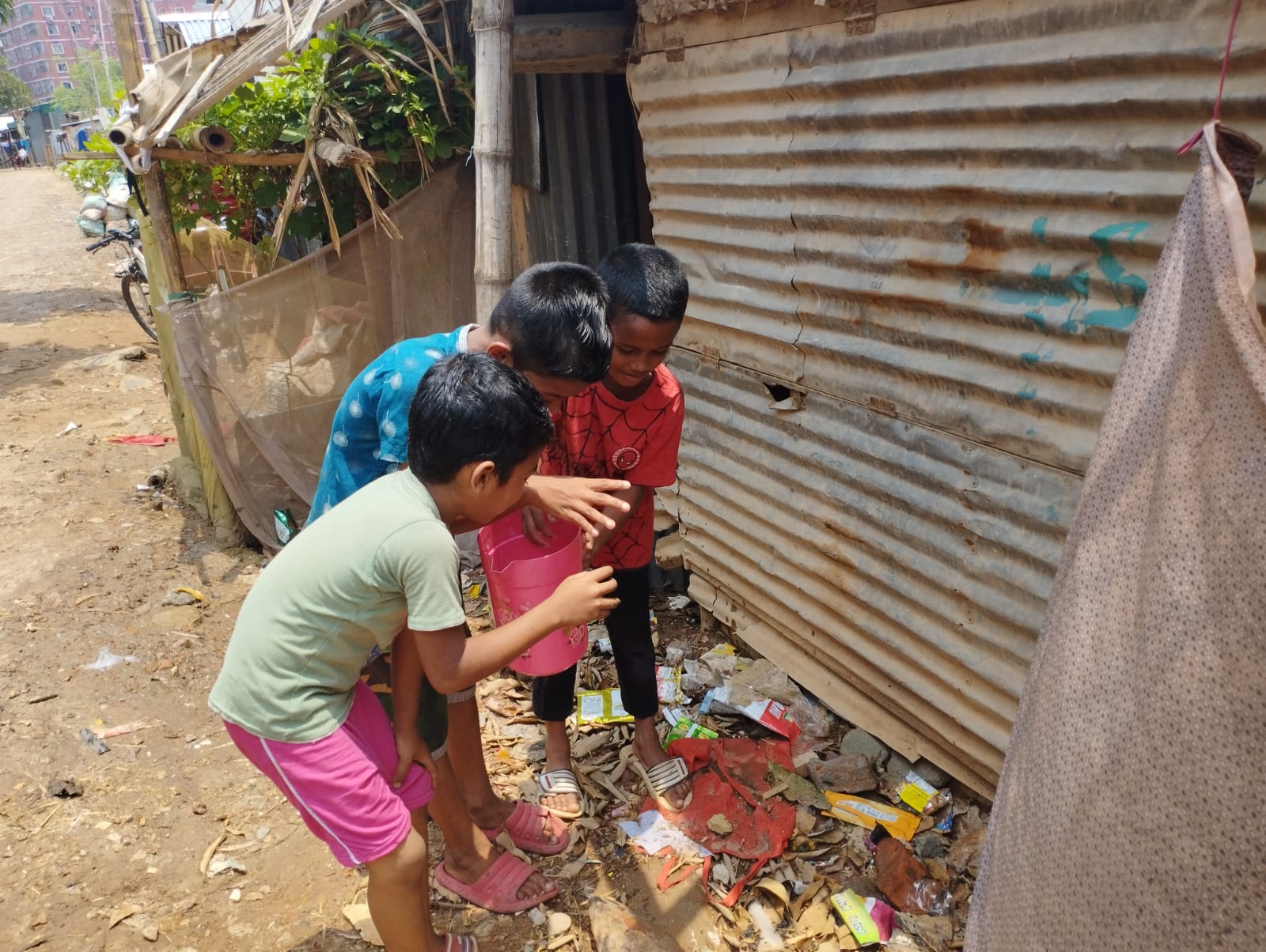 Morsalin Rifa and Abdur Rahman Using Disinfectant 