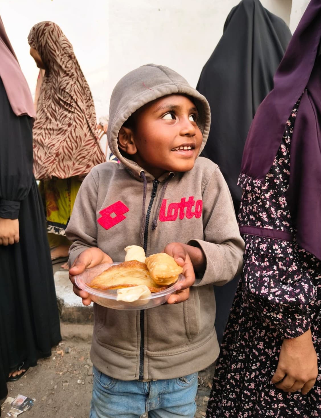 Abdur participating in pitha utshob