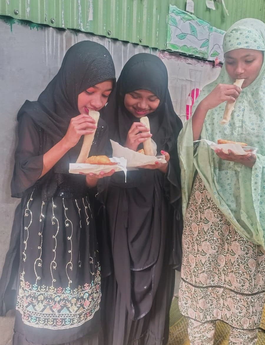 Kids in Mirpur participating in pitha utshob