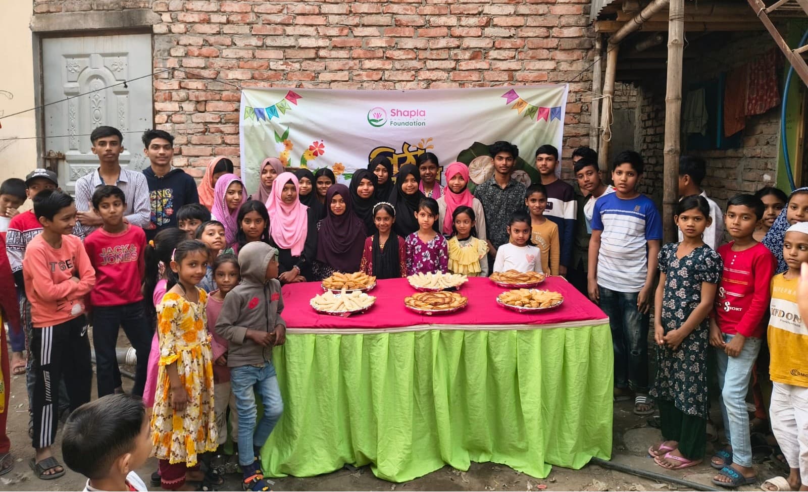 Kids in Mohakhali participating pitha utshob