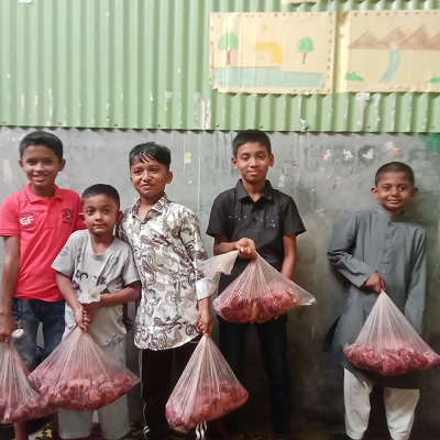 Kids in Mirpur received the meat Shapla Foundation
