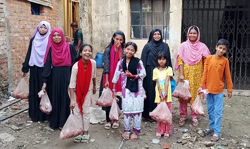 Kids in Mohakhali received the meat from Shapla Foundation