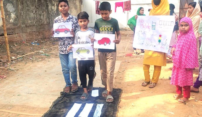 Kids in Mirpur participated in road safety awareness program
