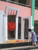 Tanjila giving flowers at shahid minar