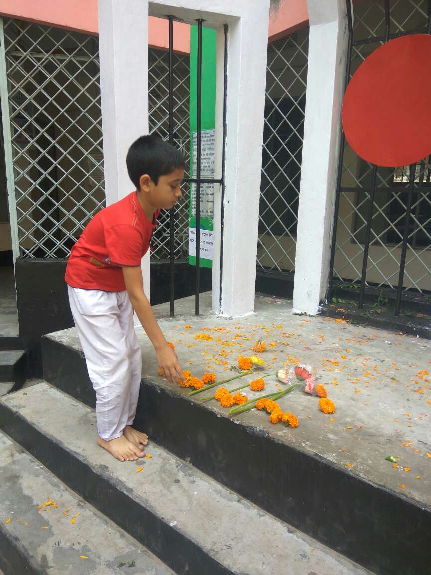 Rakib giving flower at Shahid Minar