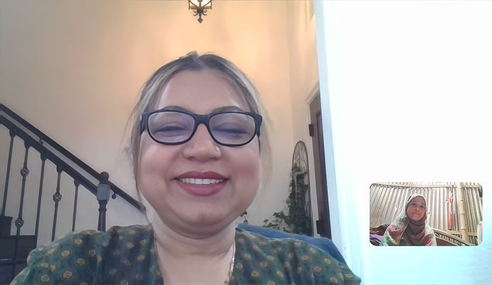 Sponsor connecting with a sponsored child through a live virtual video meeting