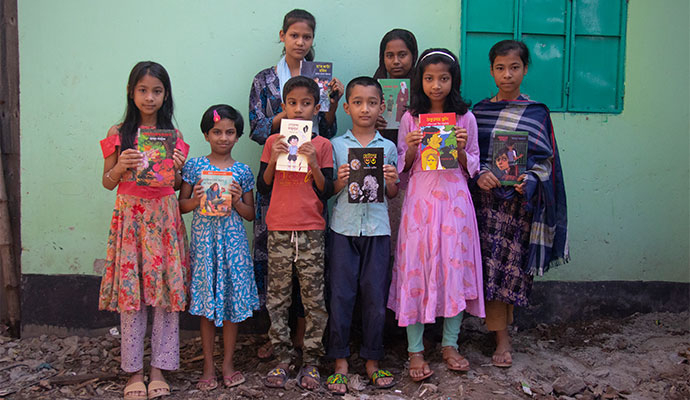 Sponsored Children Reading Story Book