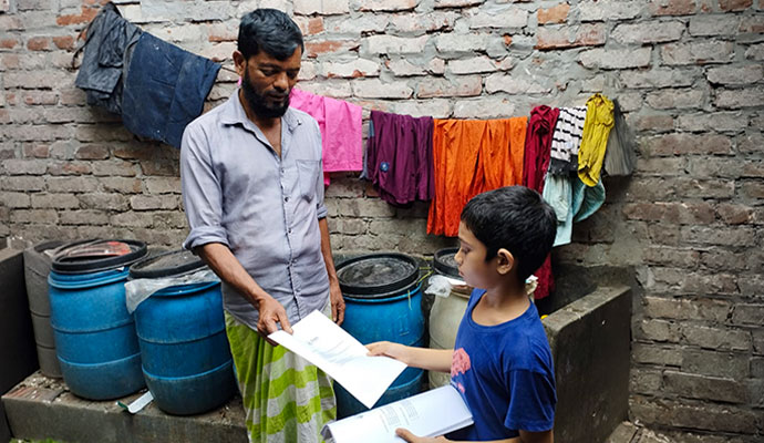 Student handing an anti-drug awareness flyer to a community member outdoors